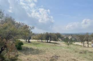 Prime 1/2 acre Dripping Springs City lot in Meadow Oaks neighborhood